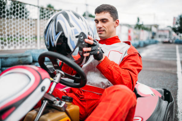 istock Go kart driver on karting speed track 806817214