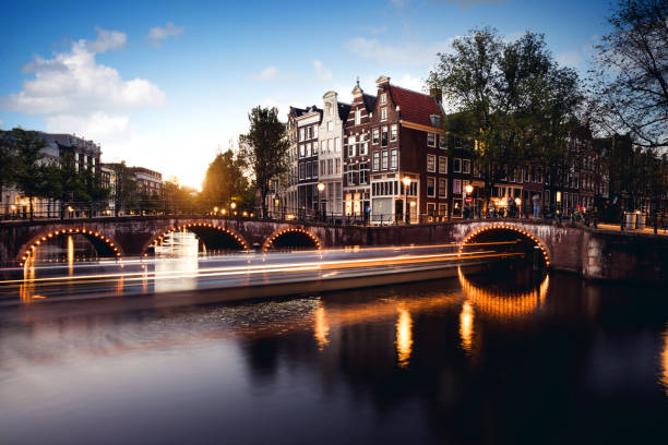 Typical bridge on the canals in the central Amsterdam, Netherlands.