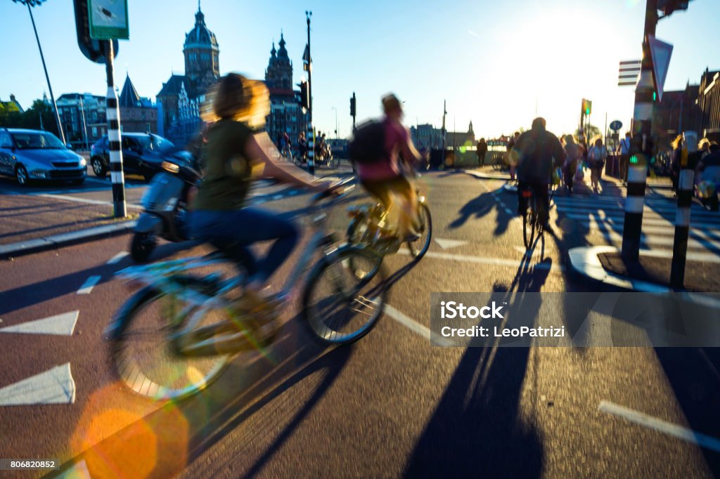 Crowded city street cyclists and pedestrians Amsterdam crowded city street, Netherlands Cycling Stock Photo