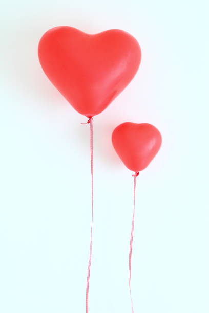 istock Red heart shaped balloons 806831750