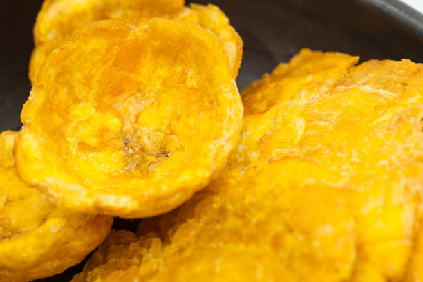istock Plantain cups and patacones on black ceramic dish 806834892
