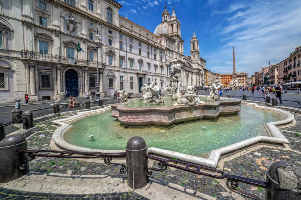 Piazza Navona with fountains Rome: Piazza Navona, Moor's fountain, Fountain of the Four Rivers and Egyptian obelisk, Agonia Church with Santa Ines. fontana del moro stock pictures, royalty-free photos & images