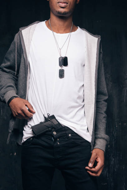 istock Unrecognizable black man show gun 806846760