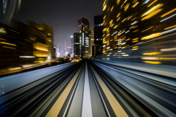 istock Motion blur train moving in city rail tunnel. 806846900