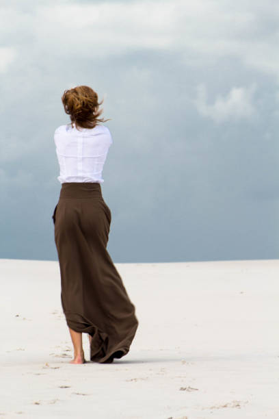 Delicate sensitive girl in the experiences in the wind