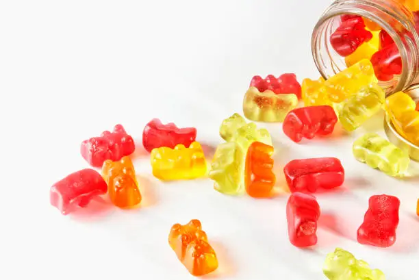 Photo of Gummies in bulk in glass containers