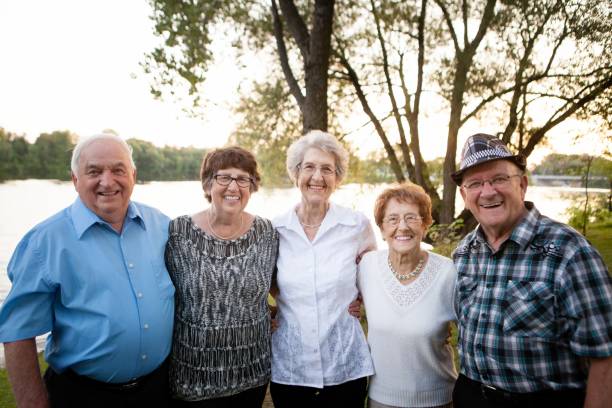 istock Goup of Senior Posing 806870140