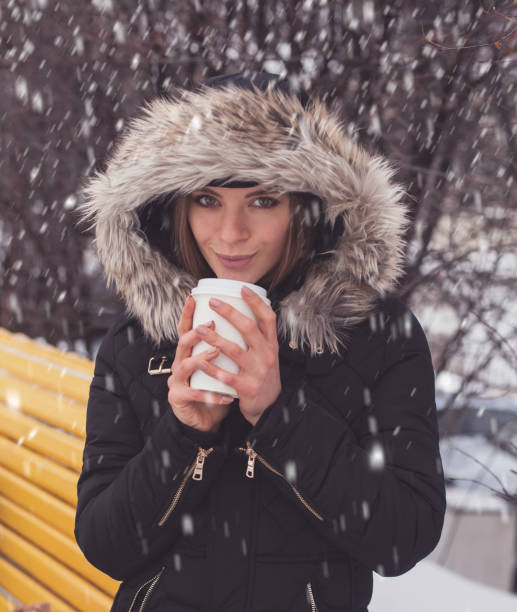 istock Woman drinking hot beverage 806870440