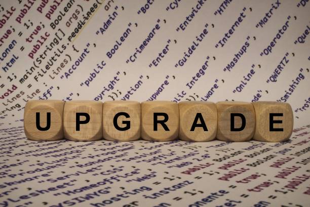 istock upgrade - cube with letters and words from the computer, software, internet categories, wooden cubes 806870616