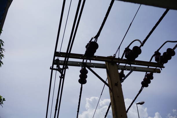 istock Electricity pylons carry power lines and cable lines 806876034