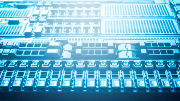 istock Bottom view of rack server storage and network against neon light in data center with dept of field in blue cool tone , technology background 806876534