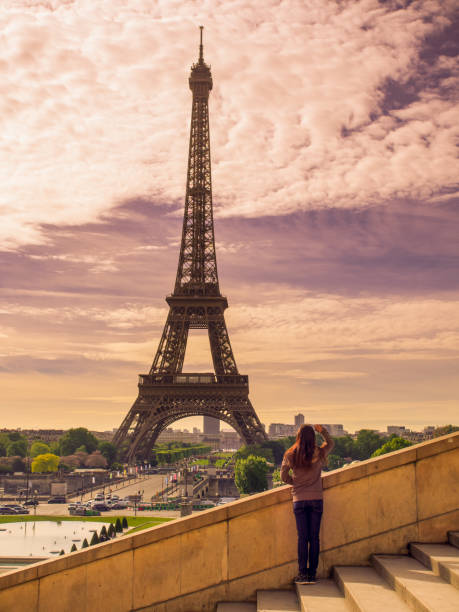 istock A girl is looking at Eiffel tower,Paris 806876816