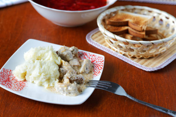 istock plate of potatoes with meat and croutons on the kitchen table 806900948
