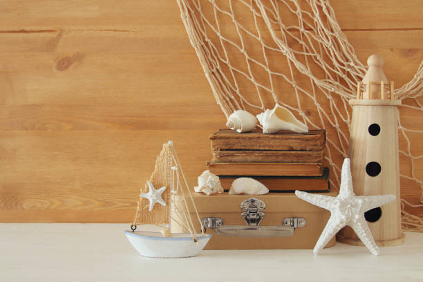 istock Nautical concept with sea life style objects on wooden table 806901068