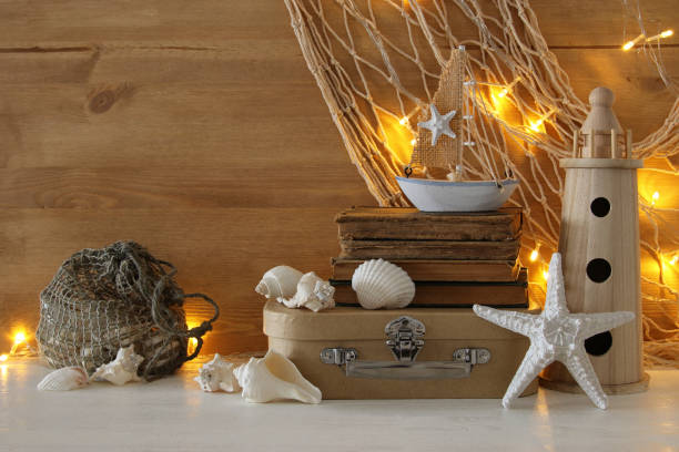 istock Nautical concept with sea life style objects on wooden table 806903902