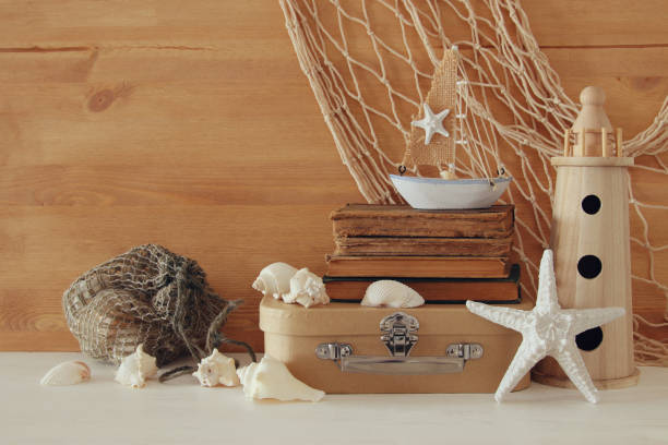 istock Nautical concept with sea life style objects on wooden table 806903936