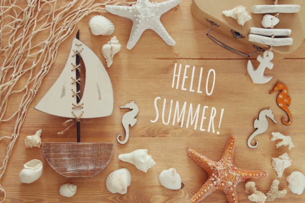 istock Nautical concept with sea life style objects on wooden table. Top view 806904172