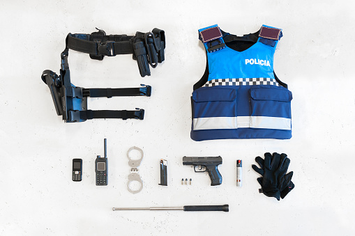 Police equipped with different material in the foreground