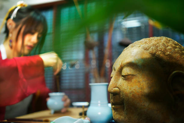 East women with incense