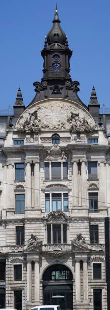 The Bernheimer Haus at Lenbachplatz is built according to plans by the Munich architect Friedrich von Thiersch and Martin Dülfer. It served as a residential house for the Bernheimer family and provided representative business premises for the trade in carpets and antiques.