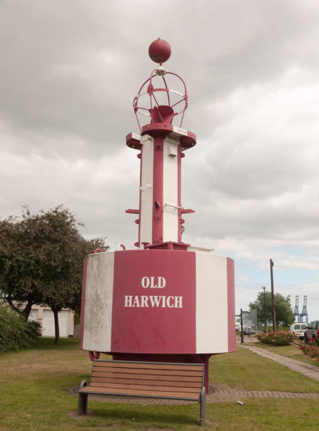 istock Stock Photo - red and white sea structure old harwich cloudy harbour 806935704