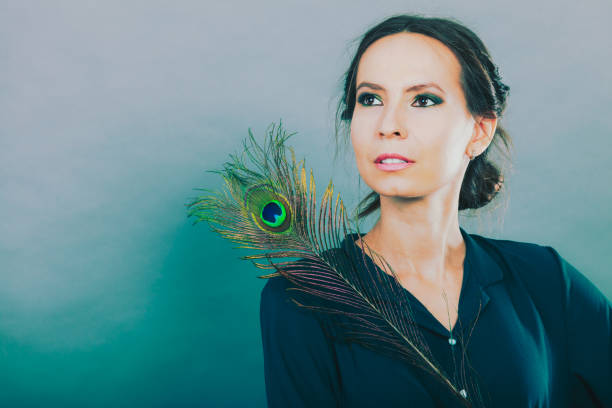 Beautiful Indian Teenage Girl With Peacock Feather