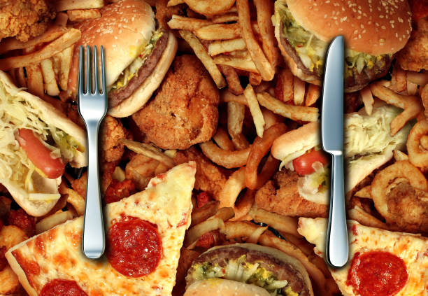 istock Eating High Cholesterol Food 806966602