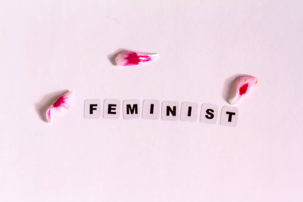 istock Feminist word written in black letters 806975704