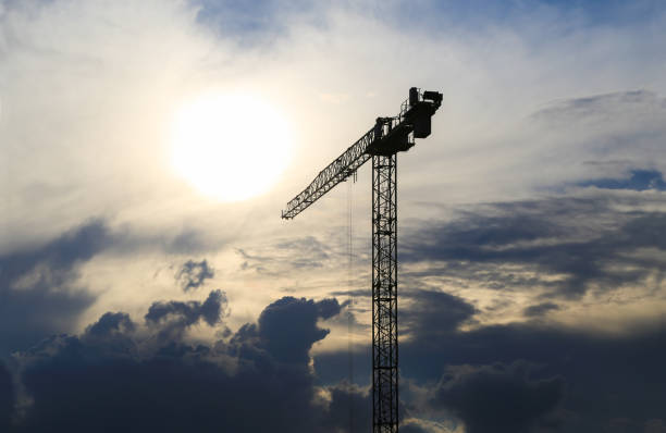 istock Modern house under construction, building crane, Sunrise ,Sunset, 806976134