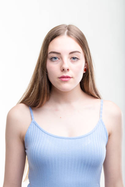 Serious young woman looking intently at camera