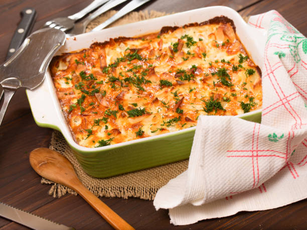 istock Dish with the baked potatoes on a kitchen table 807001570