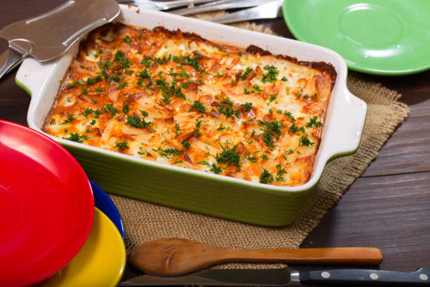 istock Potatoes baked in sour cream and tableware 807001602