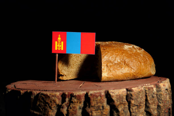 Mongolian flag on a stump with bread isolated stock photo
