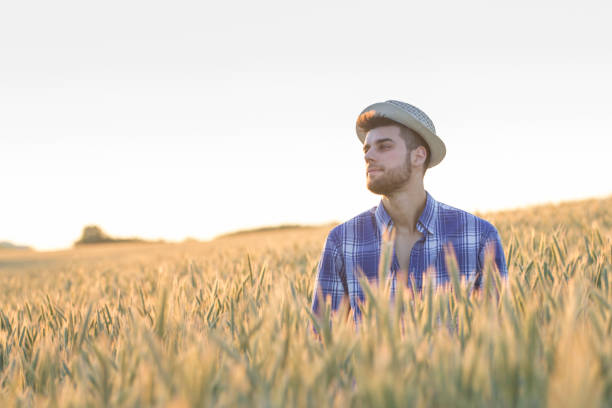 istock Guy in the middle of the field 807006516