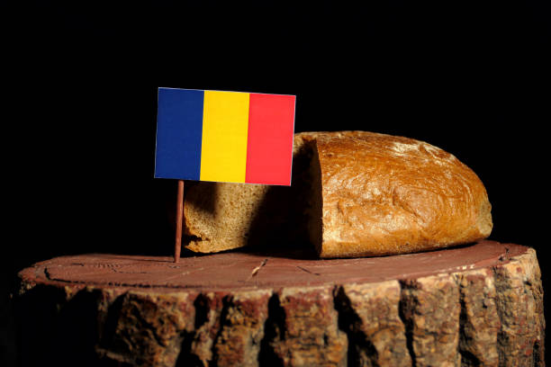 istock Romanian flag on a stump with bread isolated 807010242