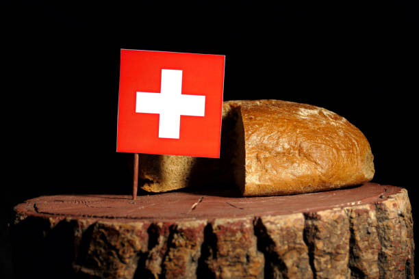 istock Swiss flag on a stump with bread isolated 807014612