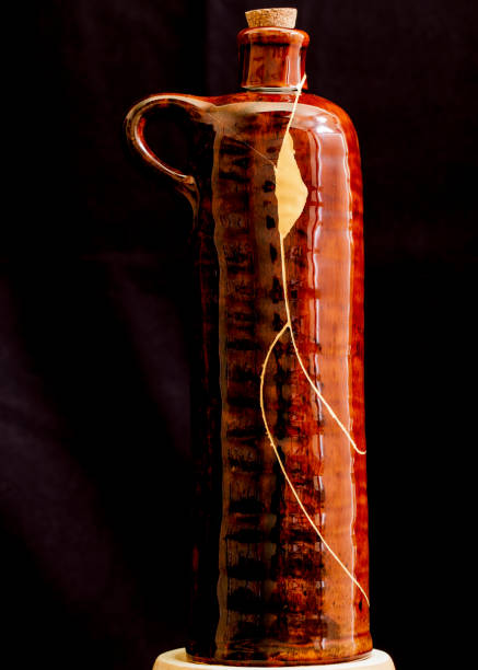 A wine bottle with kintsugi repair.