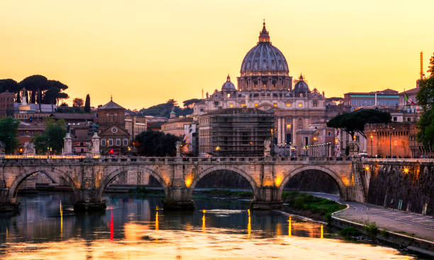 istock Skyline with bridge Ponte Vittorio Emanuele II and classic architecture in Rome, Vatican City scenery over Tiber river. 807070708