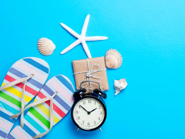istock sandals, seashells, gift, alarm clock and starfish 807103762
