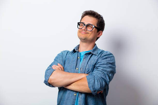 istock Young man in glasses and shirt happy himself, 807110792