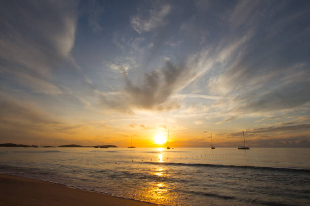istock sunrise on the beach 807120226