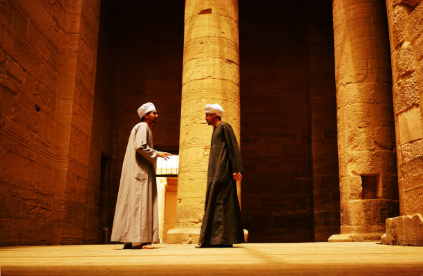 Abydos, Egypt - April 16, 2017: An Egyptian temple watcher is on display to visitors. The size of the pillars is from 10 to 22 meters high.