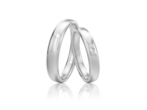 istock 3D illustration two silver classic wedding rings with diamond with reflection 807132724