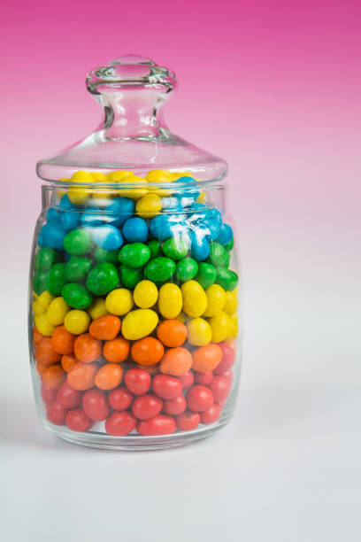 istock Colorful candies in glass jar 807176398