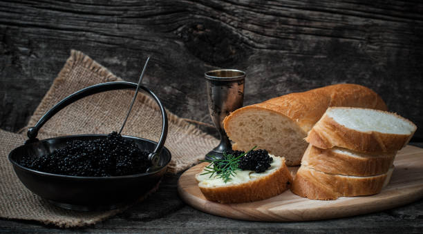 istock Sandwich with black caviar and butter 807185348