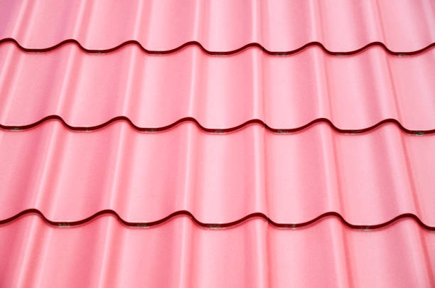 istock New steel sheets  on metal roof 807196304