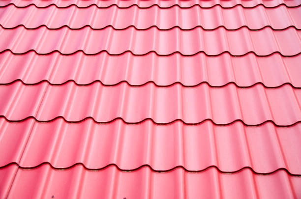istock New steel sheets  on metal roof 807198744