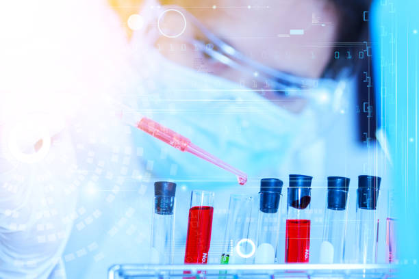 istock Flask in scientist hand with test tubes for analysis. 807198924