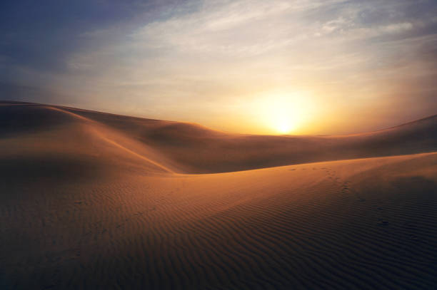 Desert sand sunset desert sand sunset in China. sand dune stock pictures, royalty-free photos & images
