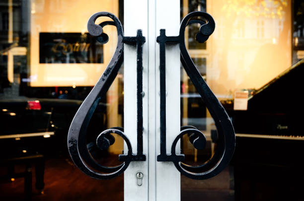 Entrance of the Steinway Haus, official showroom of handcrafted Steinway & Sons pianos in Vienna Vienna, Austria - May 17, 2017: Entrance of the Steinway Haus, official showroom of handcrafted Steinway & Sons pianos on the Ring Strasse (Vienna, Austria), on may 17, 2017 expensive grand piano stock pictures, royalty-free photos & images